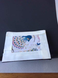 Covering the Outside of the Passort Holder