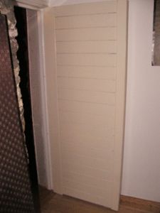 Door Made From an Old Church Pew Back.