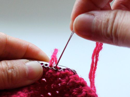 How to Attach a Purse Onto a Sew-on Frame