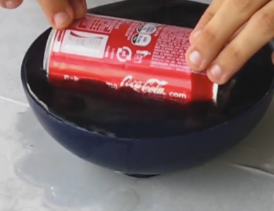 Submerge the Can in the Recipient Containing Water