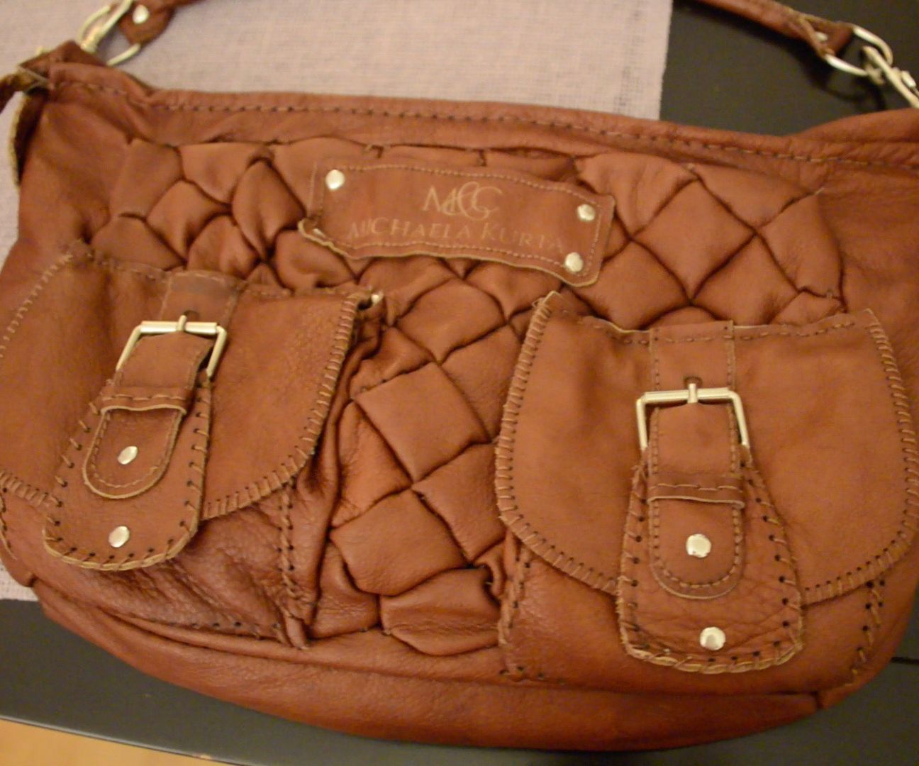 Woman's Handbag Made of Laser-Cut Leather With Phone Charger and LED Light