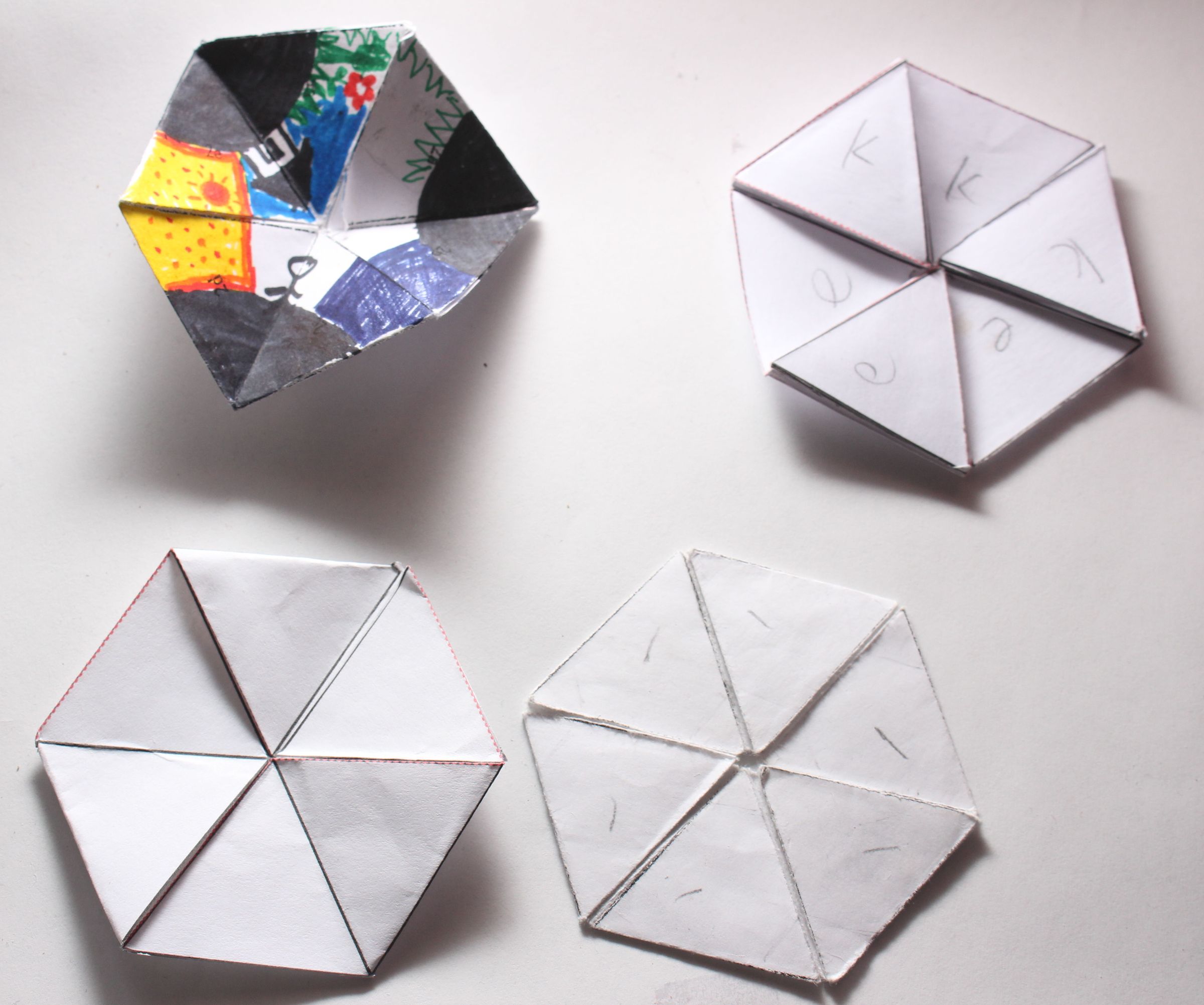 Trihexaflexagons and Hexahexaflexagons
