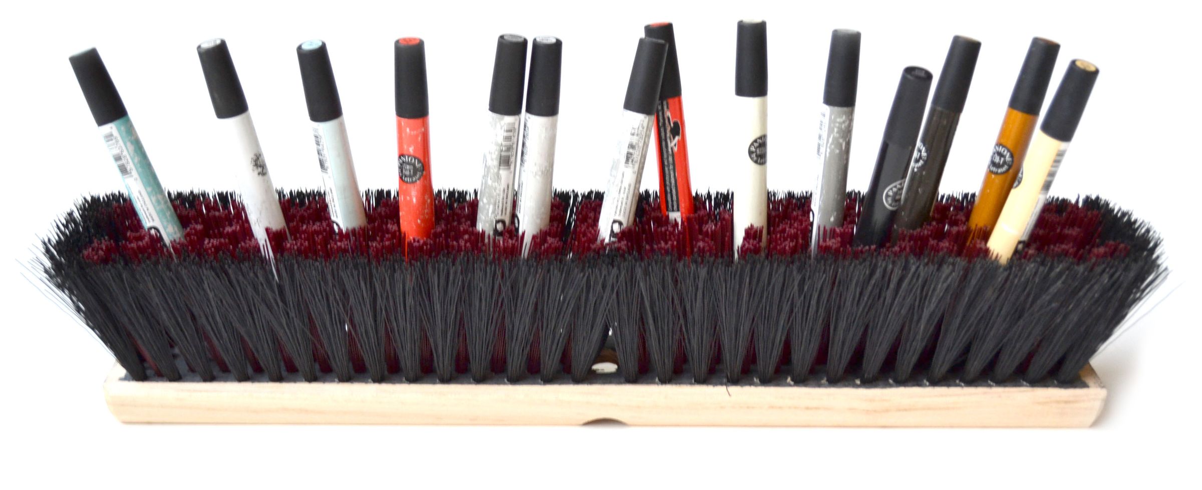 Use a Floor Brush to Organise Your Desk