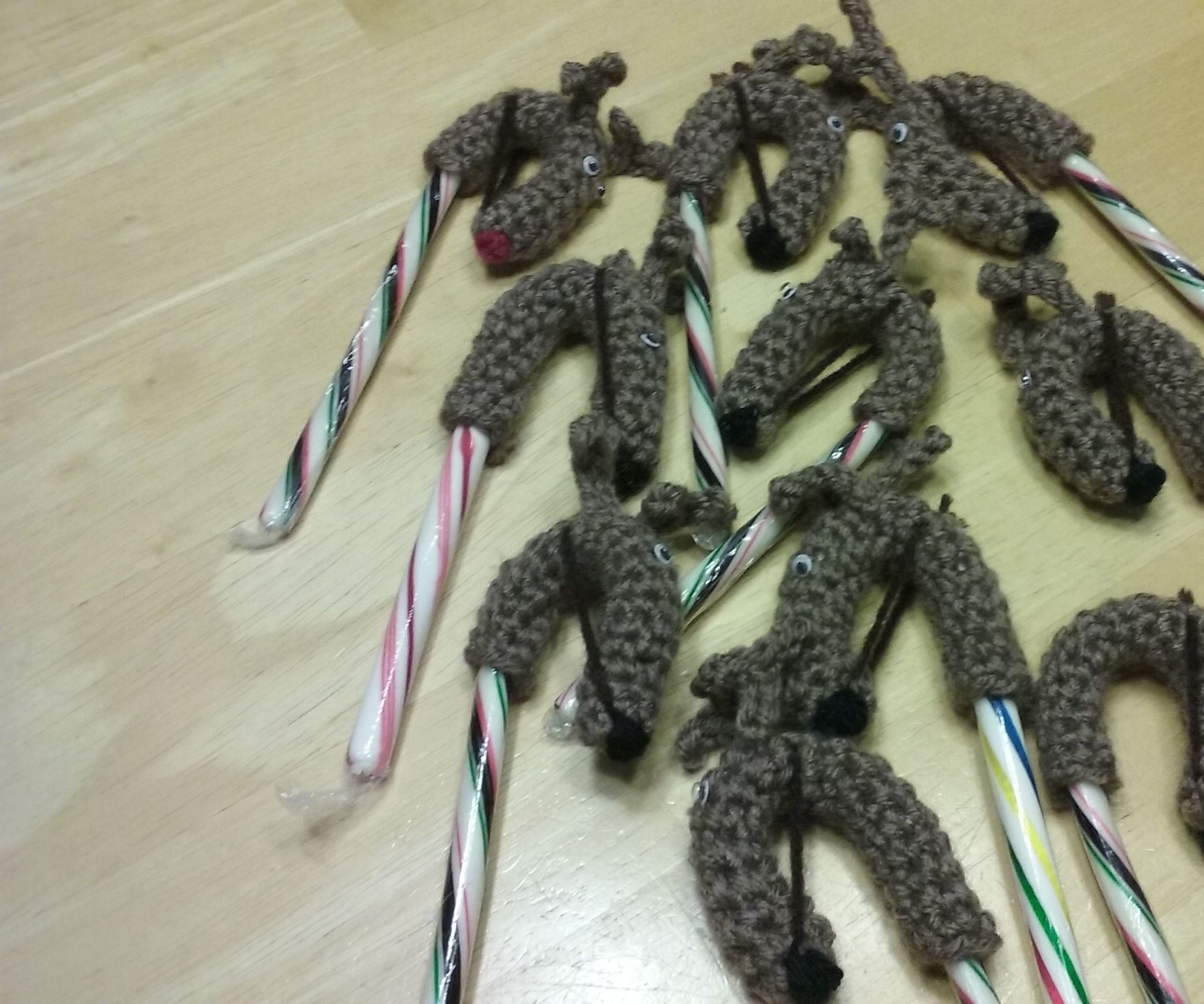 Crocheted Reindeer Candy Cane Covers