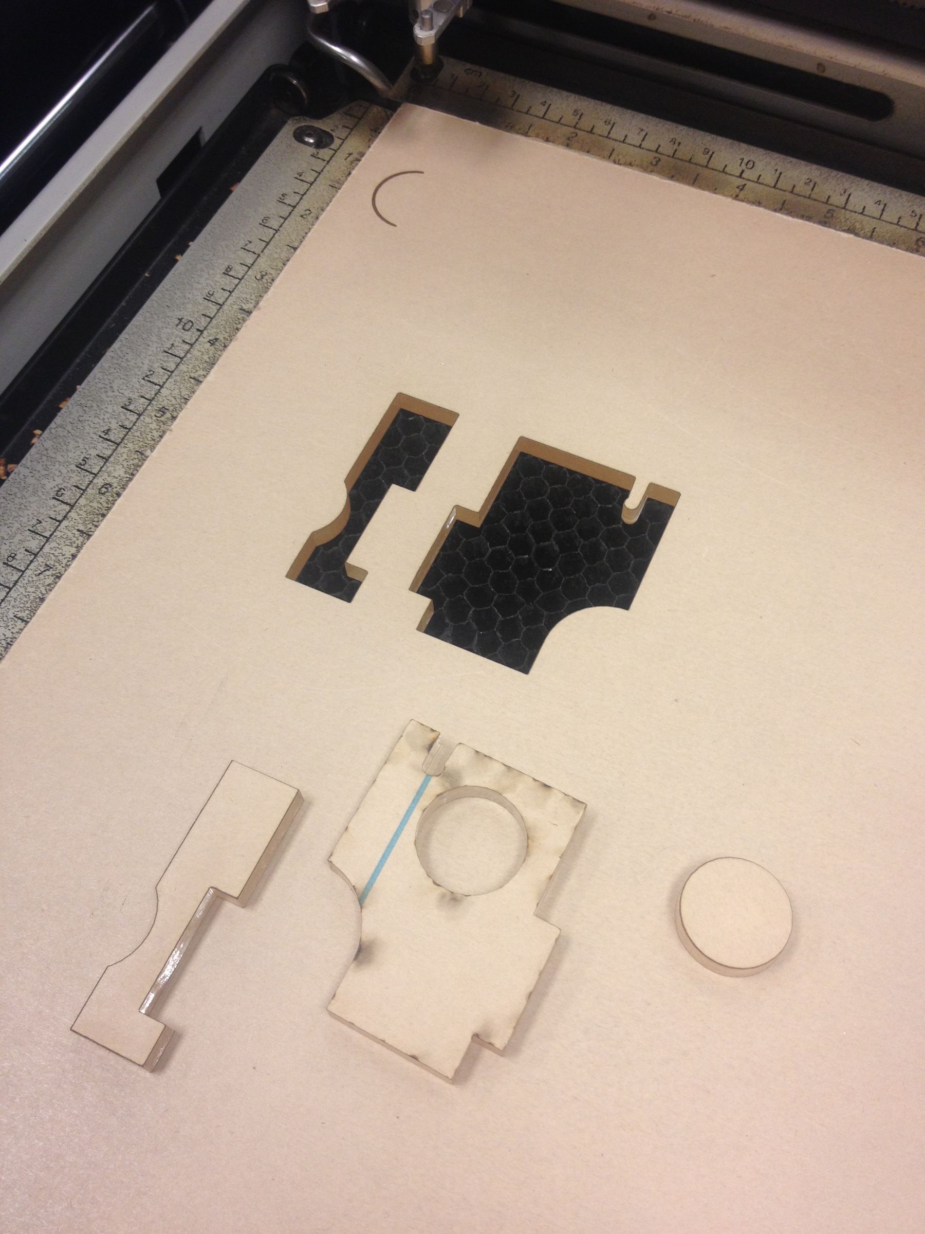 How to remove laser cut parts without removing the rest of the acrylic
