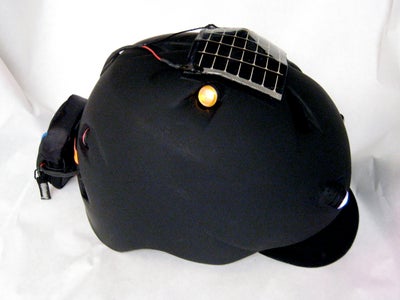 The Green Helmet (Solar Powered, Safety Lit, Weatherproof Bike Helmet.) 