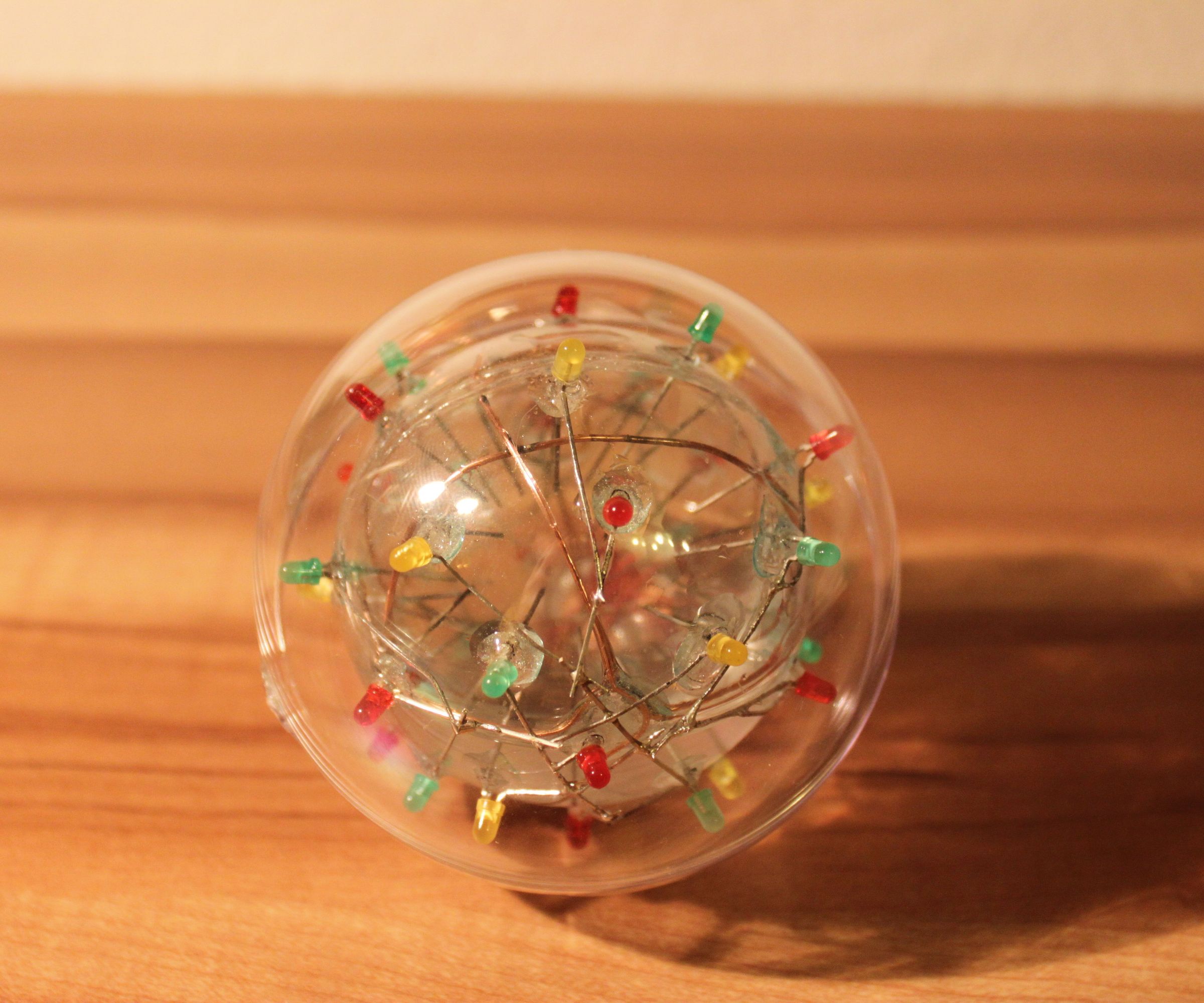 Flashing LED ball with saline water