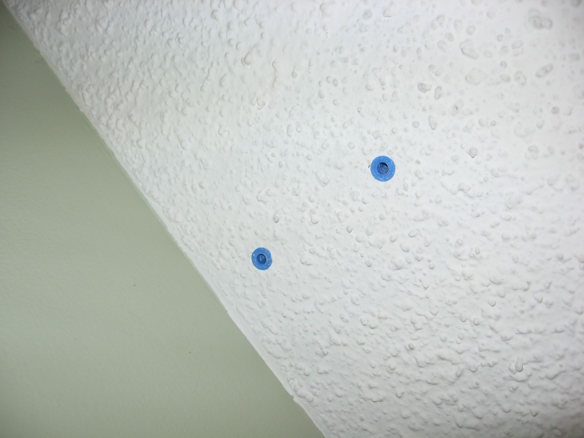 Fixing Ceiling Holes Made by Drywall Anchors