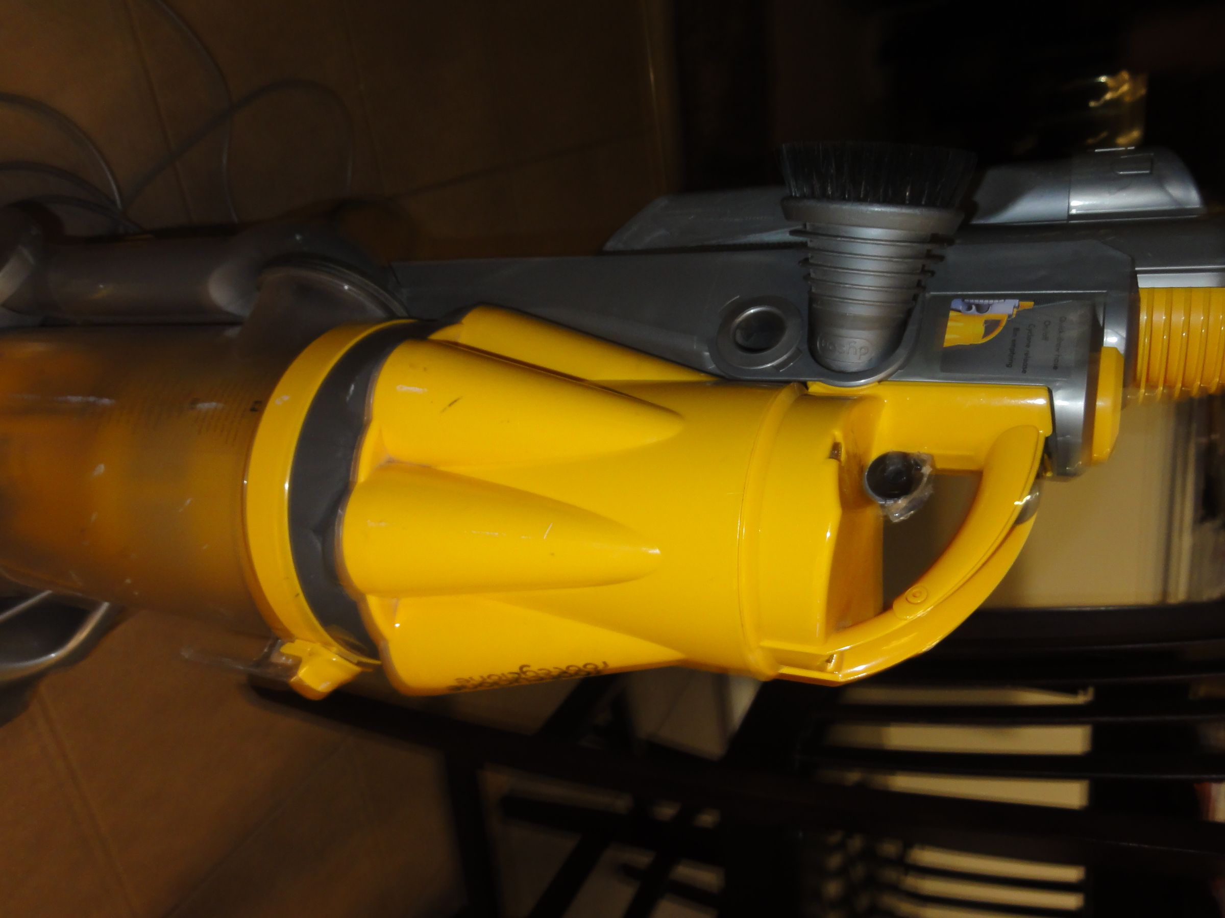 Repair a Dyson Vacuum Trigger (to Empty Dirt) Instructables