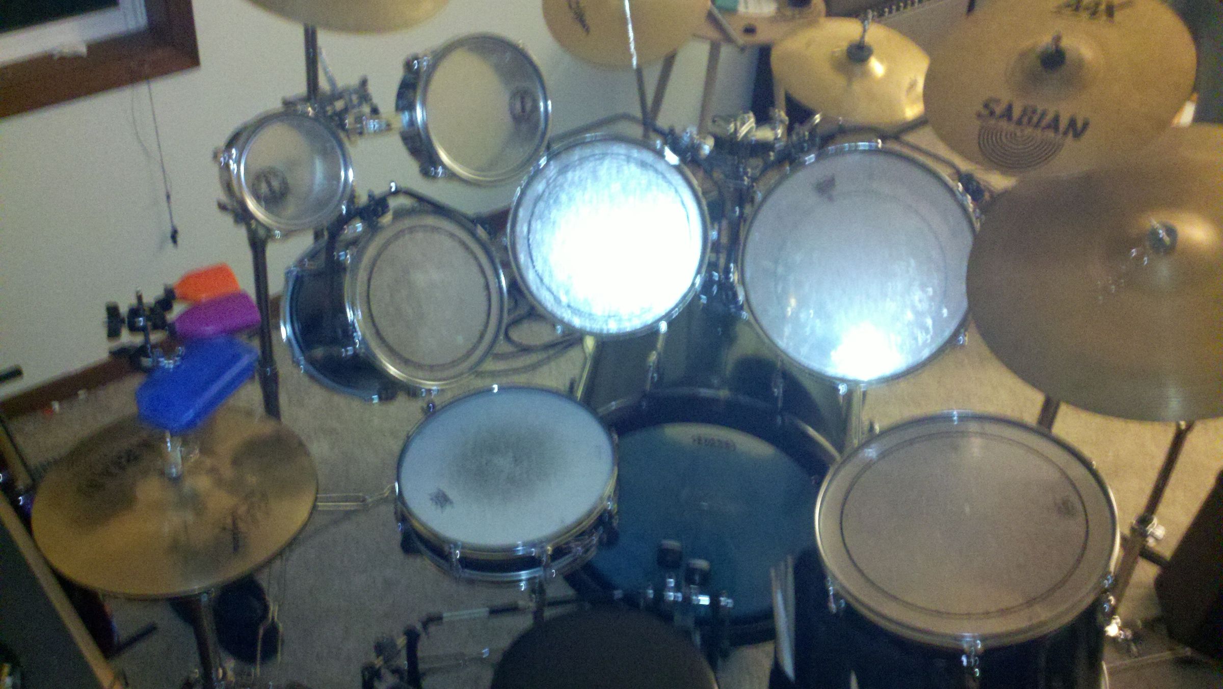 Make Wall Decor out of old battered Drum Heads