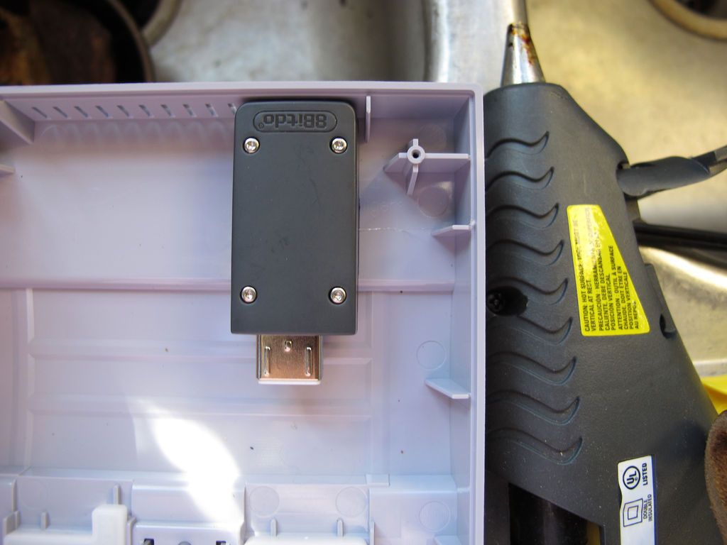 Secure Adapter to Interior of Console, Put Console Back Together. Play Games! :)