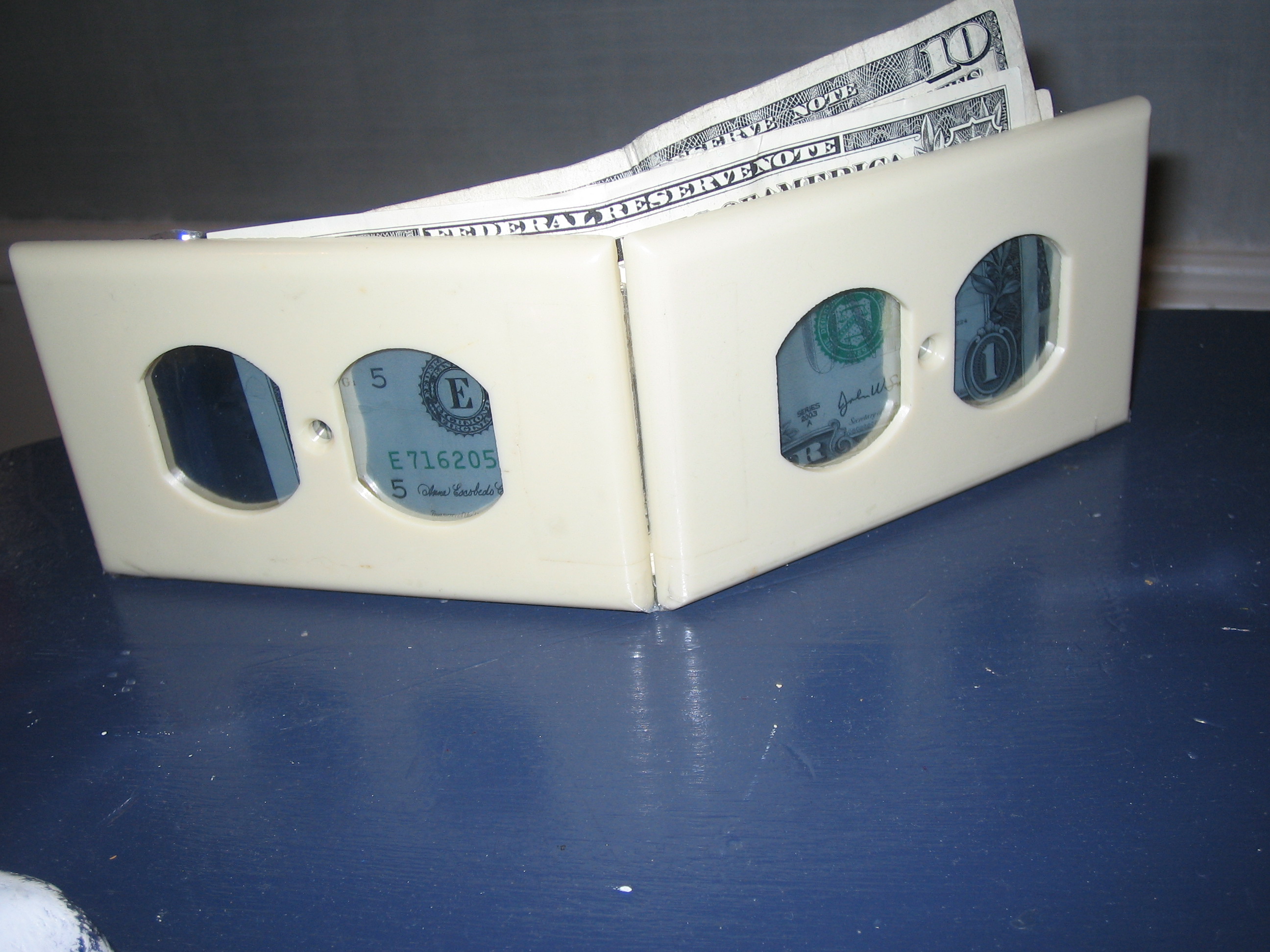 Wallet Made From a Wall Outlet