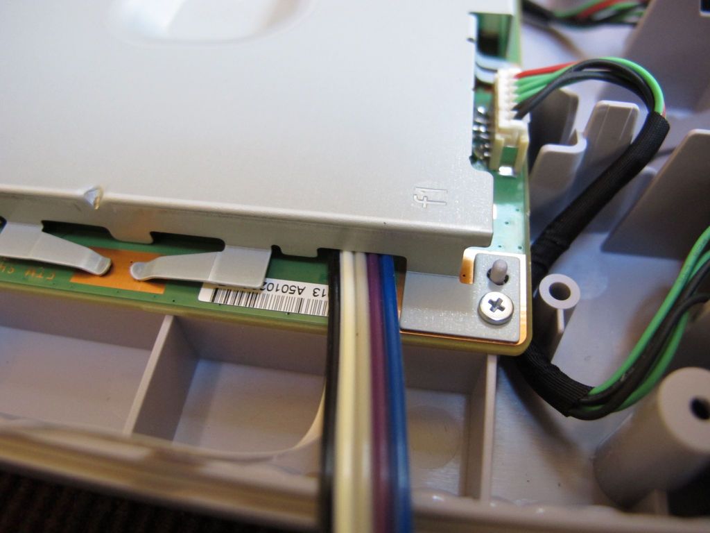 Secure Adapter to Interior of Console, Put Console Back Together. Play Games! :)