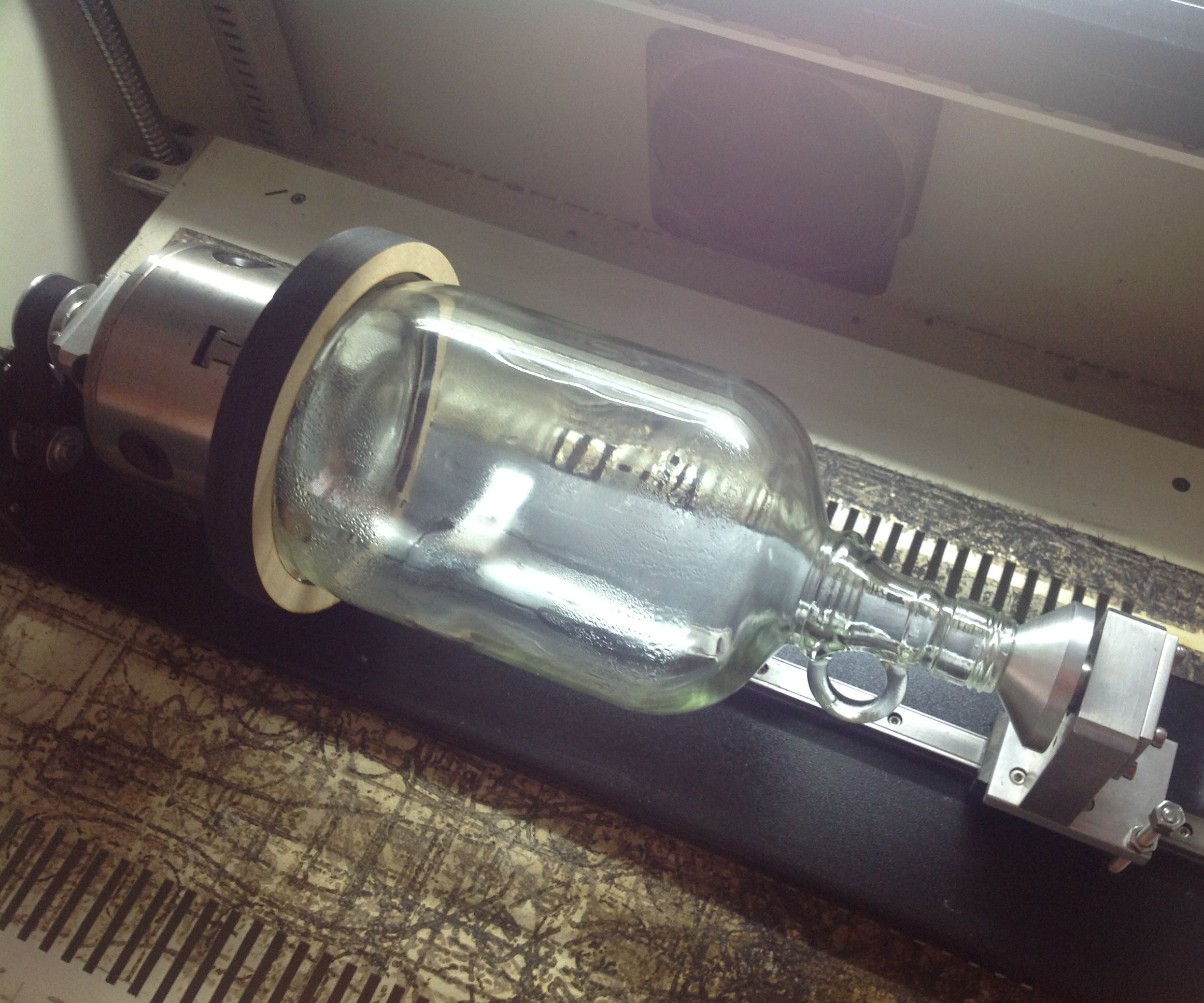 Engraving cylindrical objects on a laser cutter with a rotary attachment.