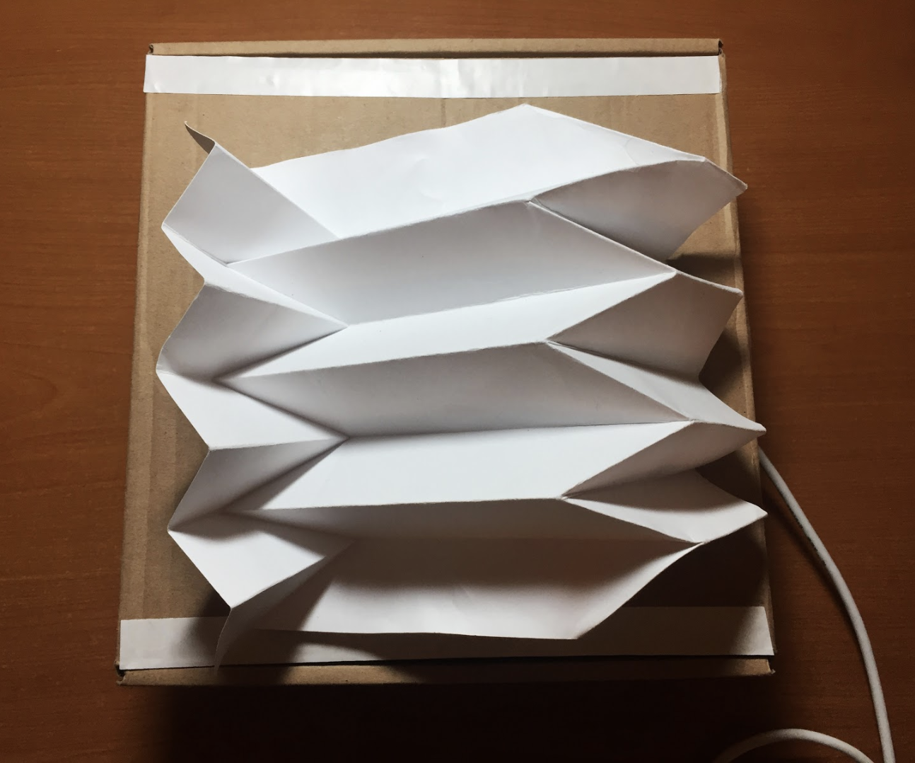 Kinetic Reverse Folding Tessellation