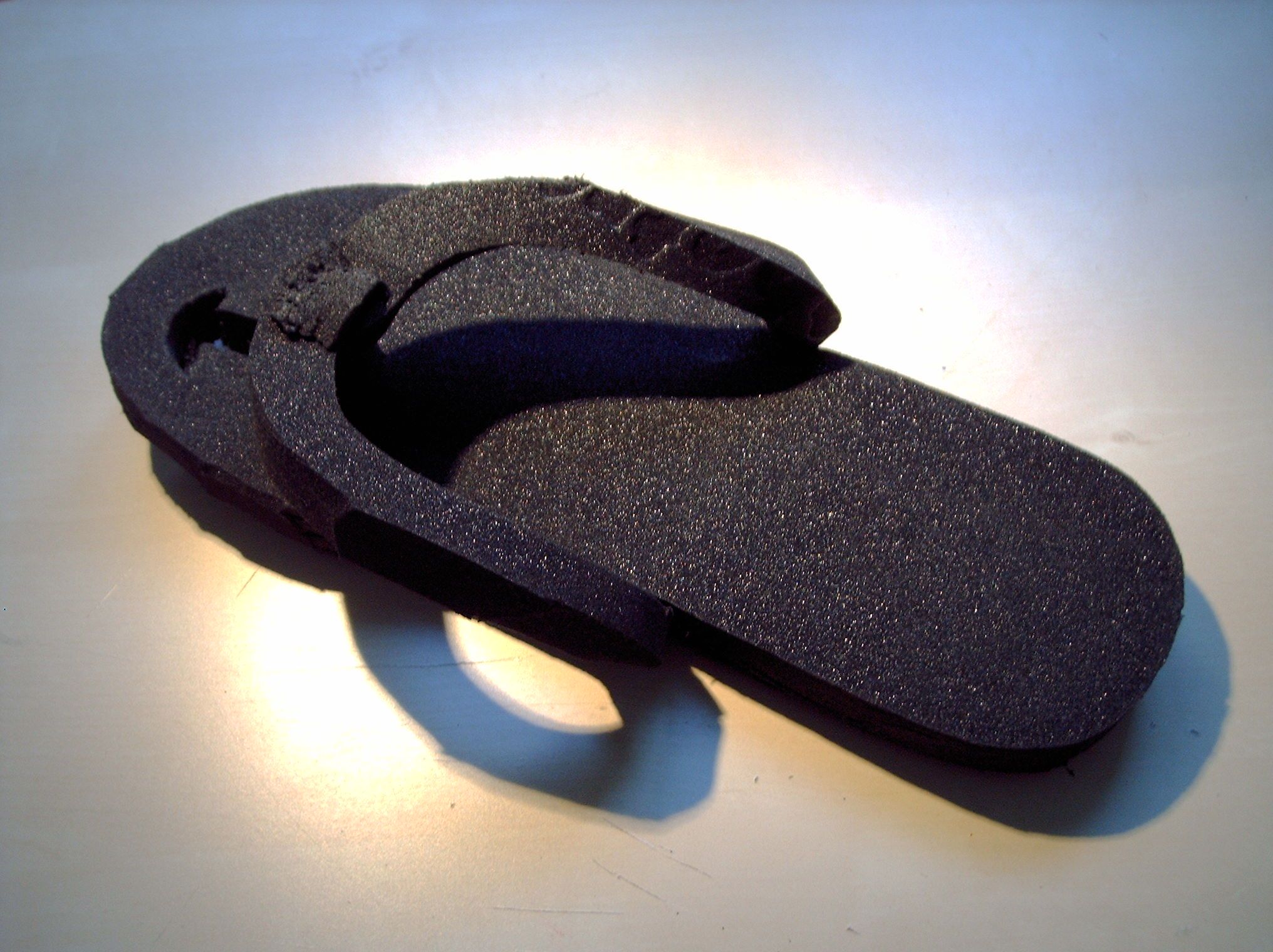 Improvised Flip Flops Out of a Camping Mat