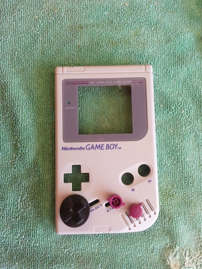 Dis-assembly of Holster, Game Boy, and Wiimote