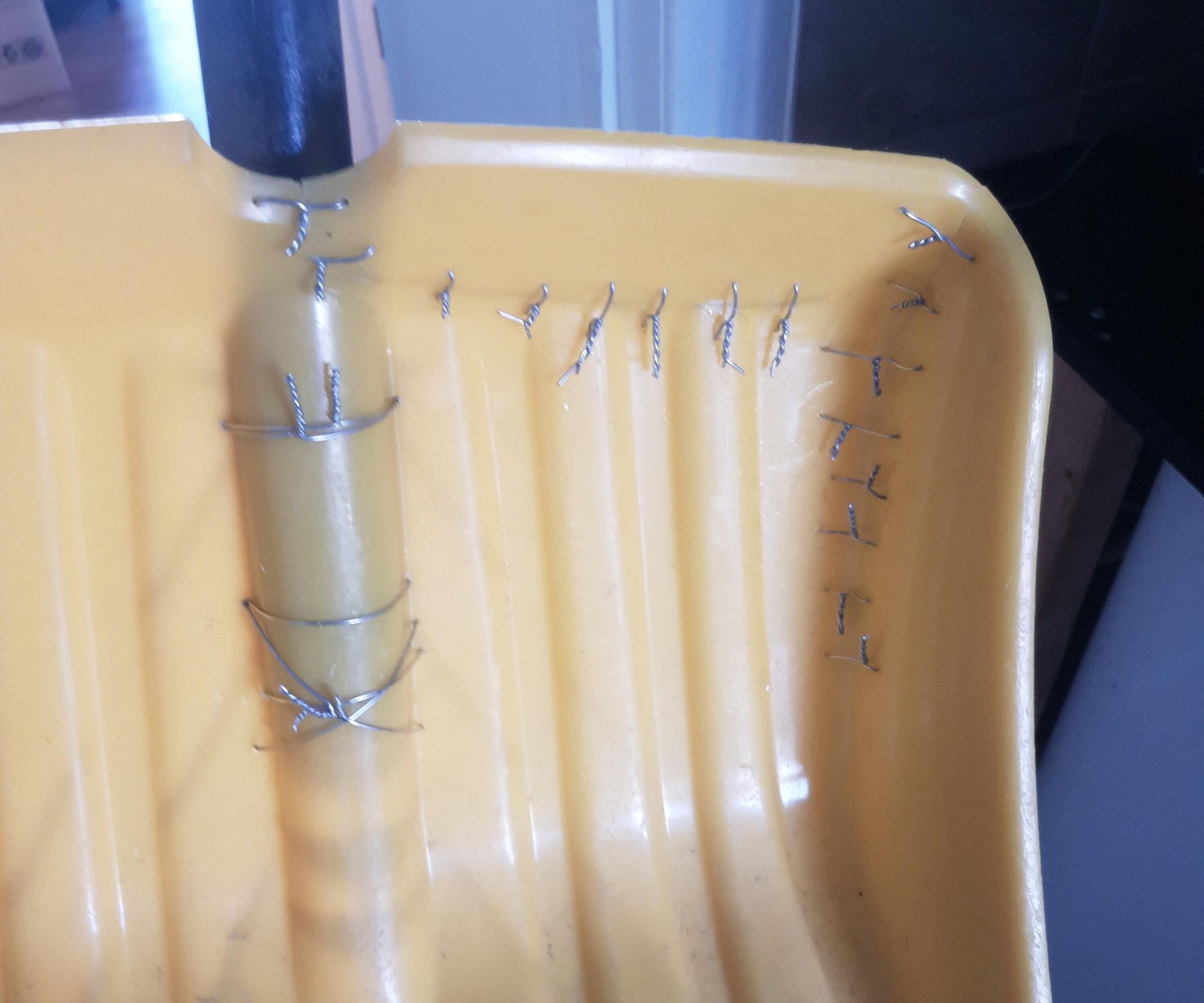 Repair a Cracked Plastic Shovel With Steel Wire