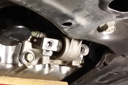 Reattach the Rear Motor Mount. 