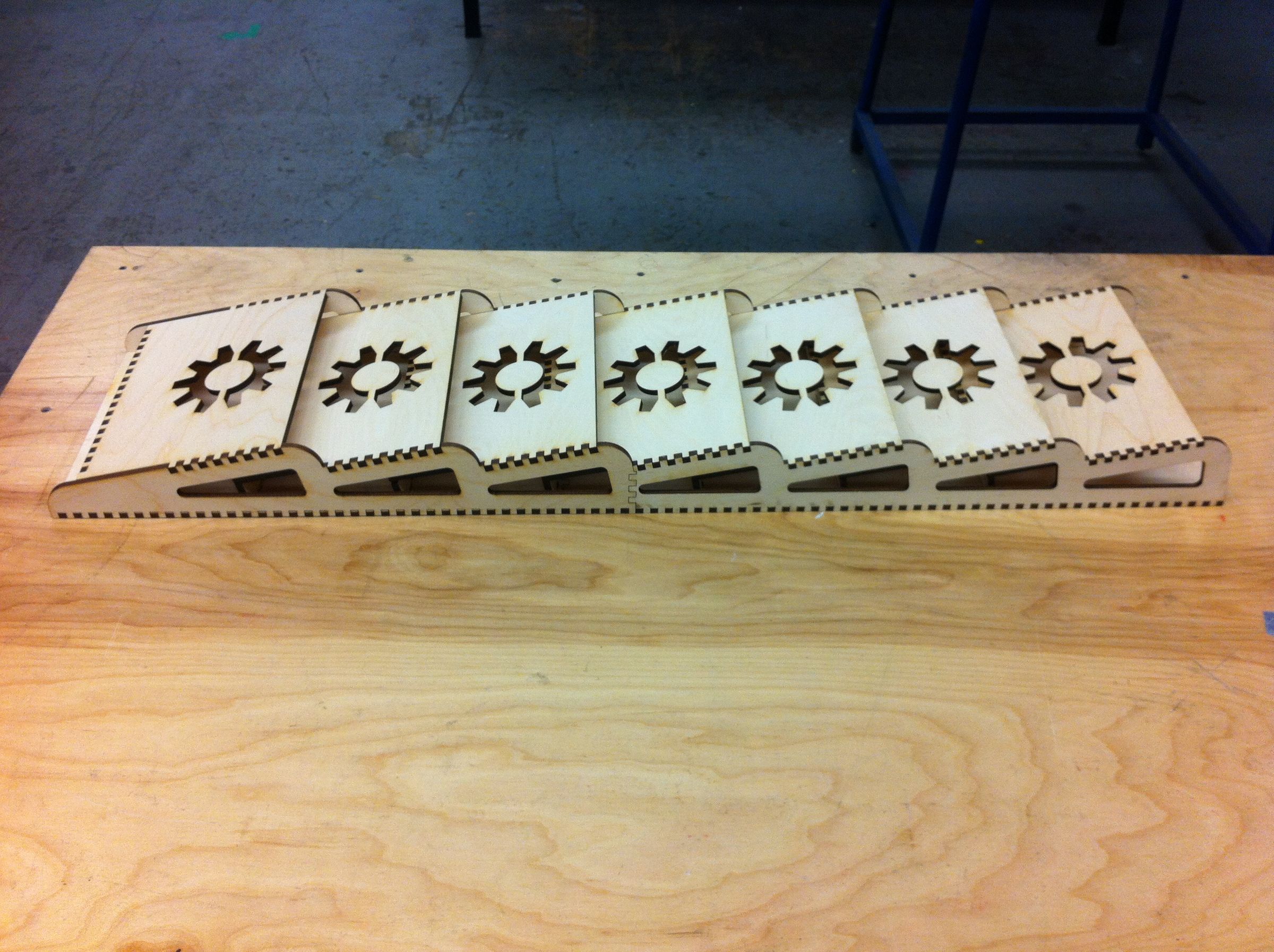 How to Make a Wall-mounted Magazine Rack Using a Laser Cutter.