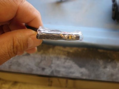 Slip the Battery and Wires Into the Sleeve