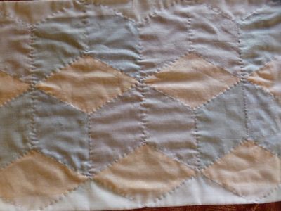 Hand-stitch the Baking to the Design