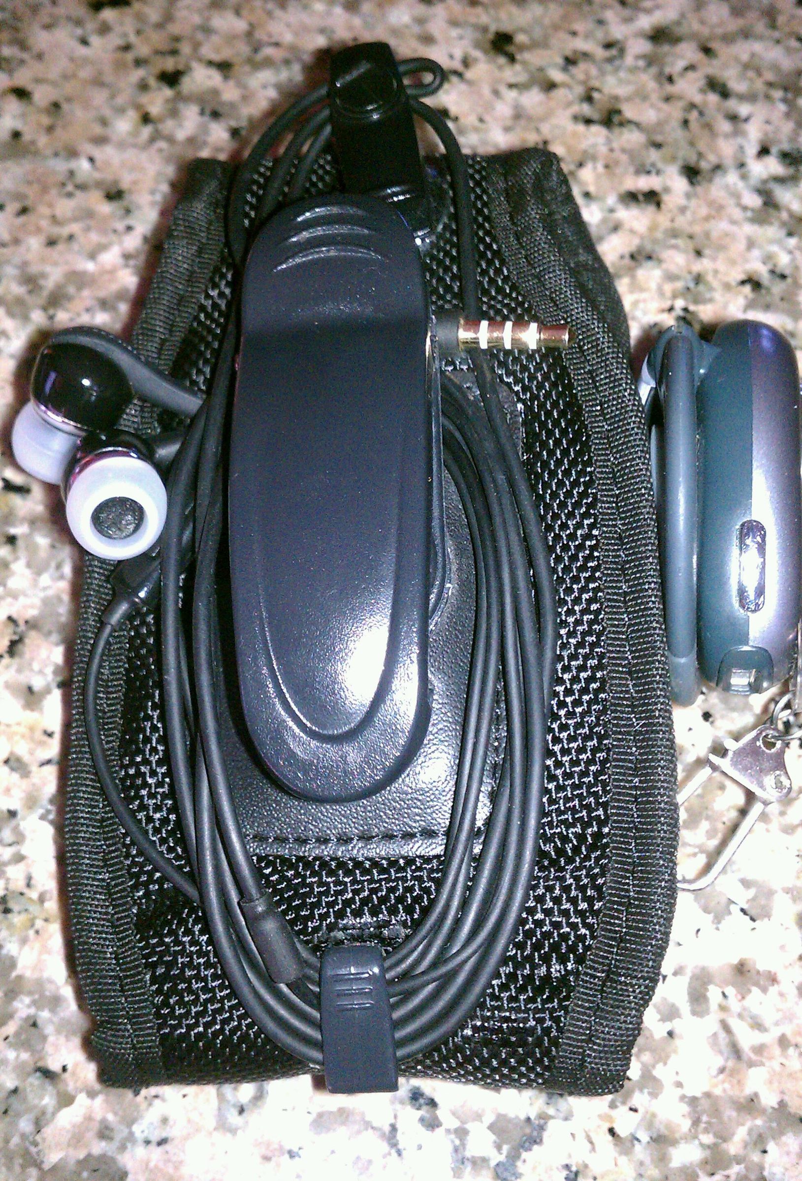 Phone, earbud, Bluetooth holster.