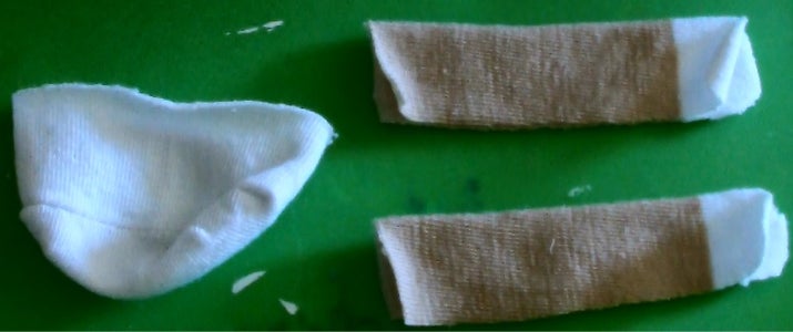 Cut Out the Arms and Mouth Pieces From Your Other Sock