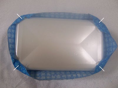 Glue Fabric Onto the Bottom Corners of the Wipe Box