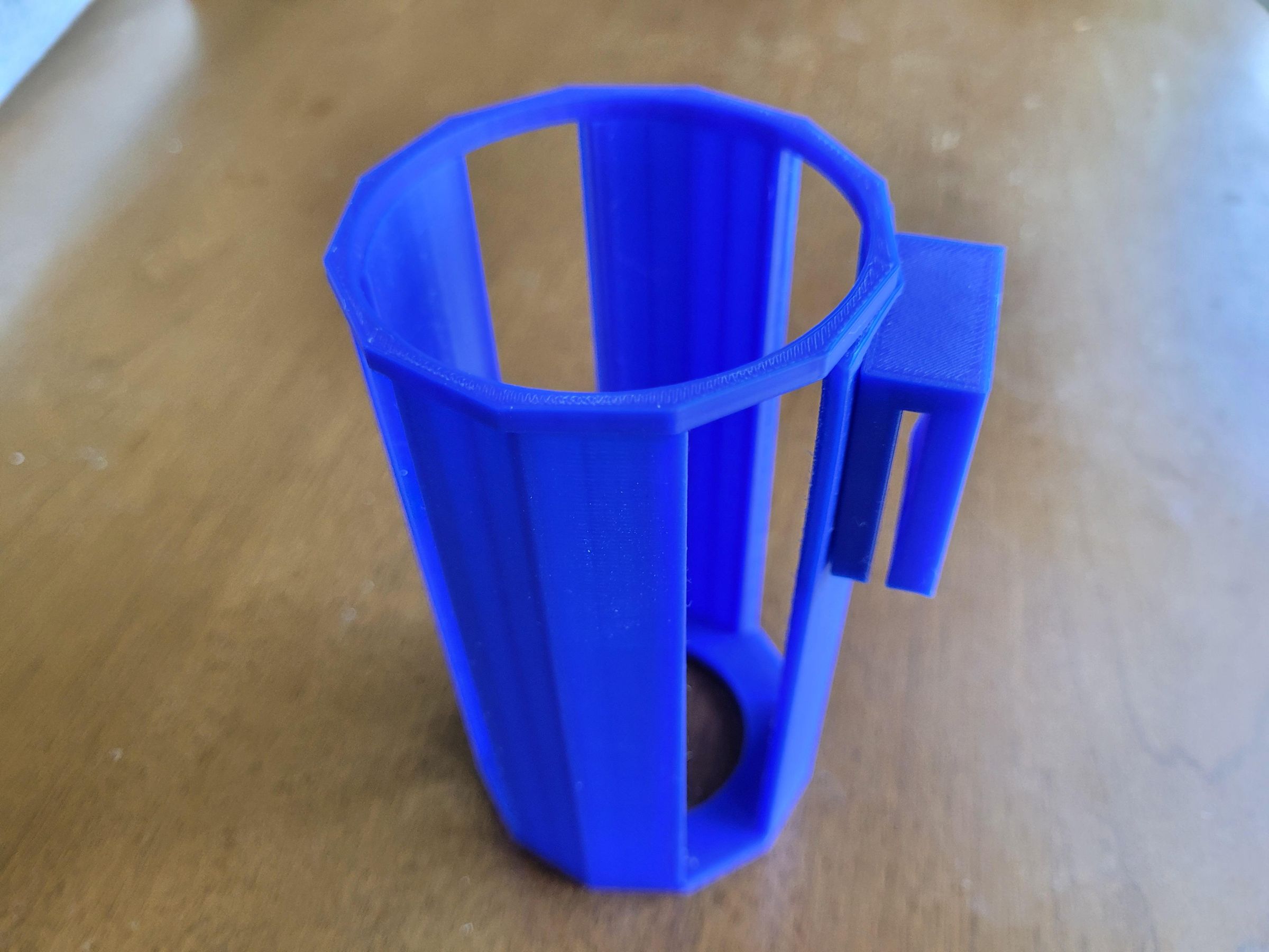 3D Printed Belt Mounted Water Bottle Holder Using Tinkercad 7 Steps