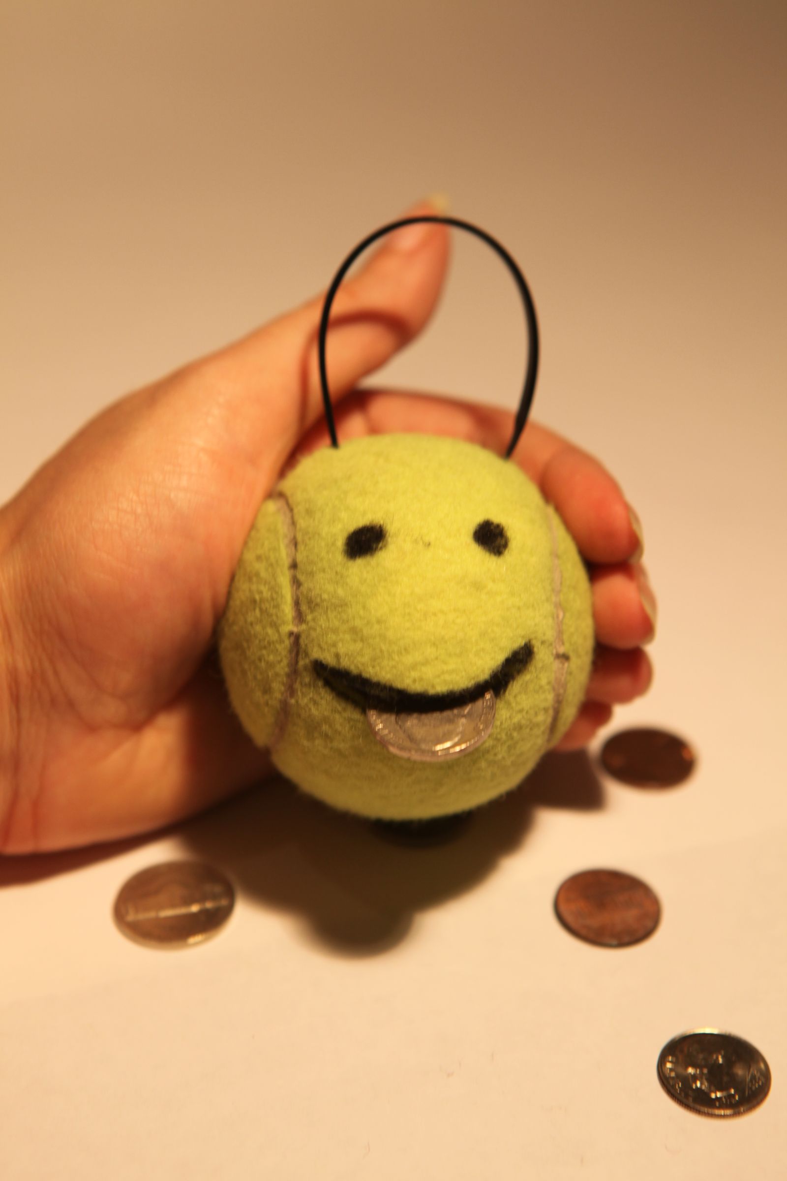 How to Make a Money Muncher From an Old Tennis Ball