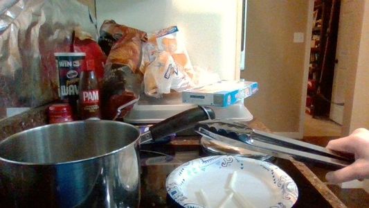 Tong Onto a Plate and Pour Water Out