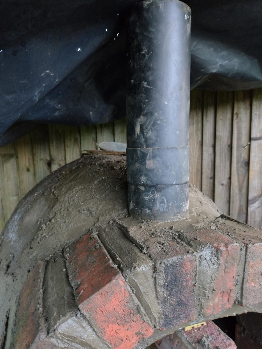 Incorporating the Chimney Flue and Building the Arched Opening