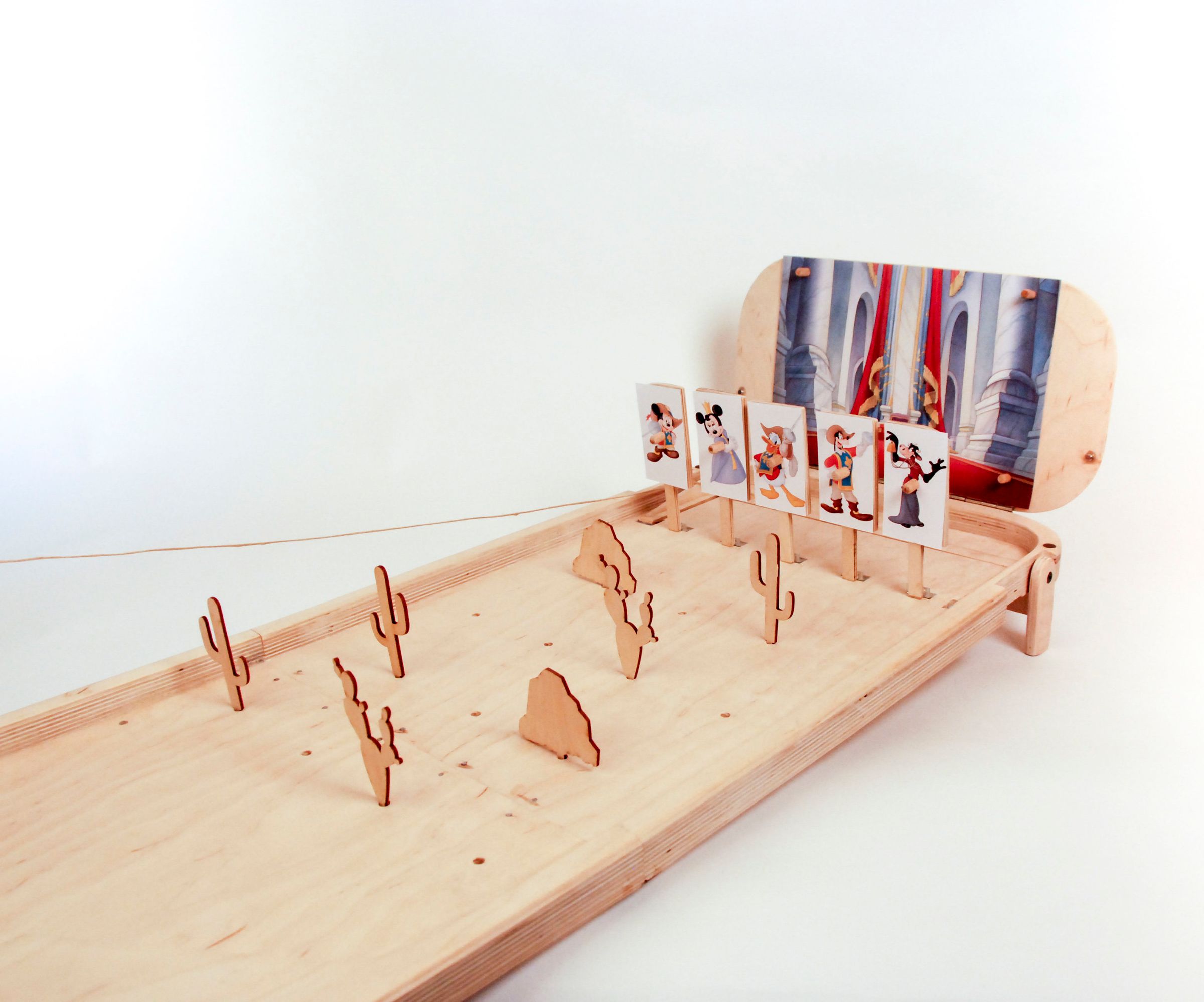 Self-resettable table-top bowling game (D4E1)