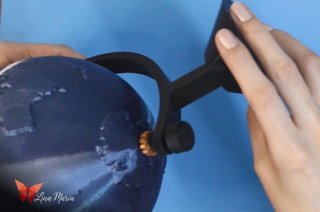 Securing the Globe Support Structure to the Base