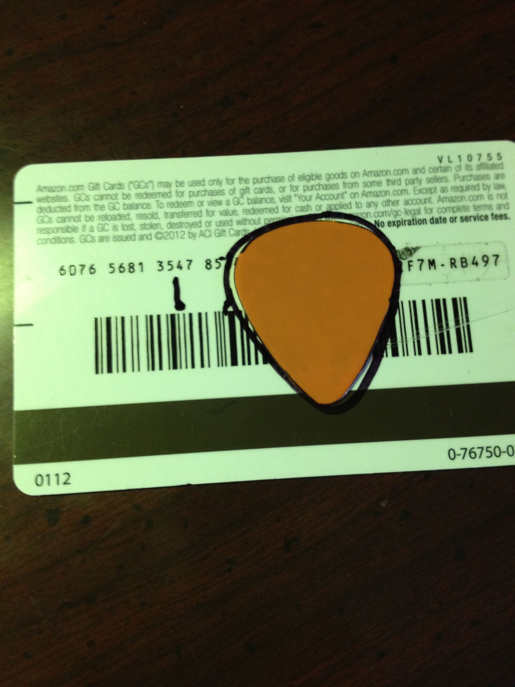 How to Make a Guitar Pick Out of an Old Gift Card/ Credit Card 5