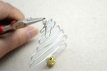 Hook on the Ear Wire Through the Loop You Just Made.