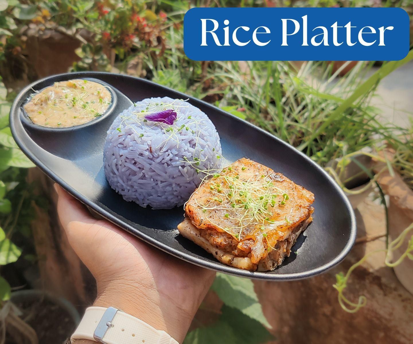 Baked Fish With Blue Rice and Mushroom Sauce