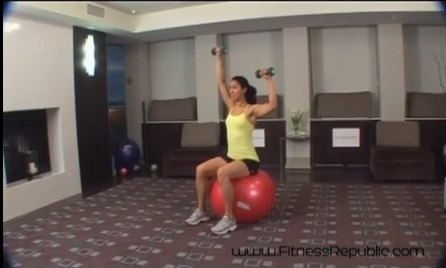 Alternating Overhead Press With DB -- Seated on a Stability Ball - Fitness Republic