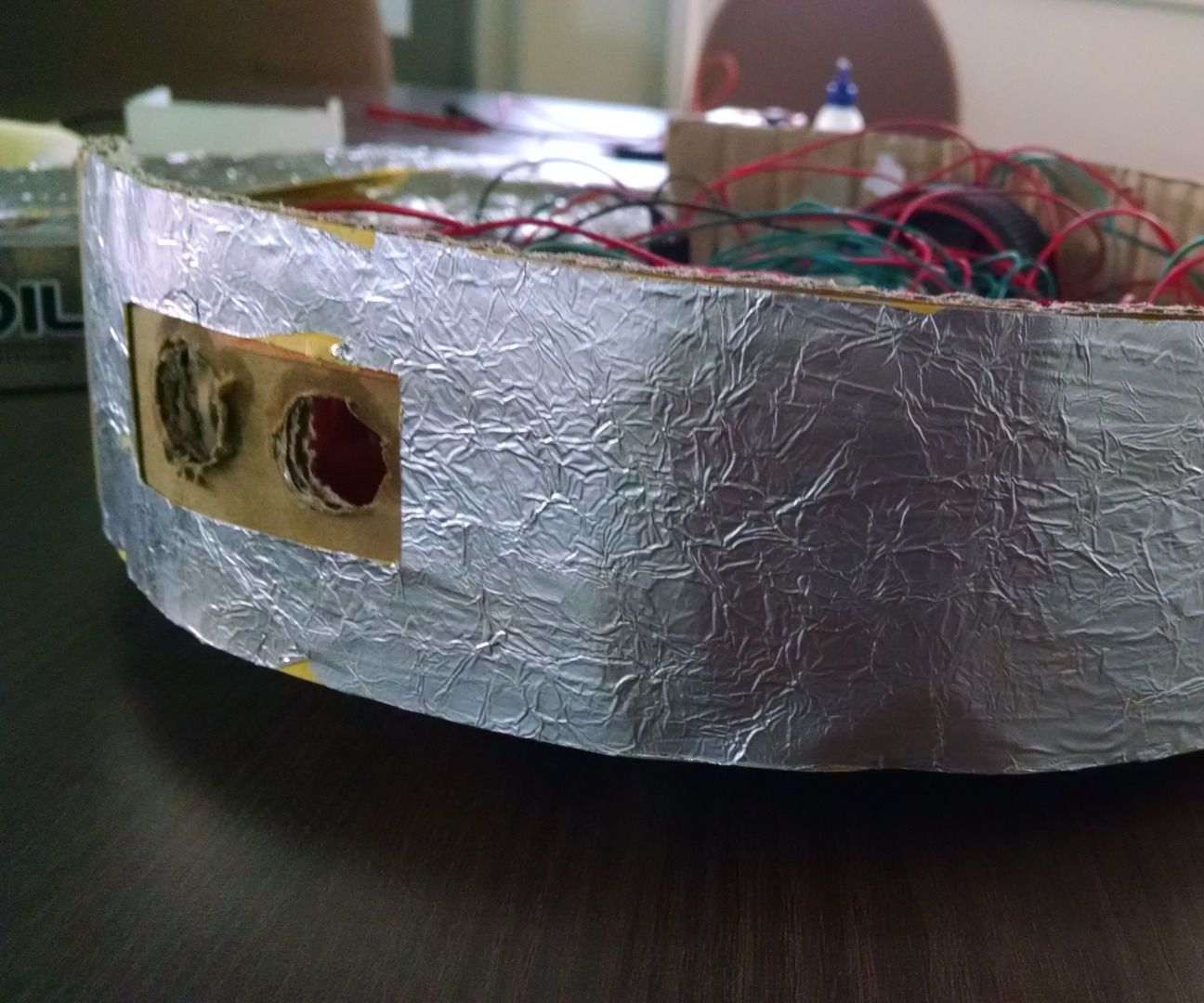 Bump detector for robots with aluminum foil