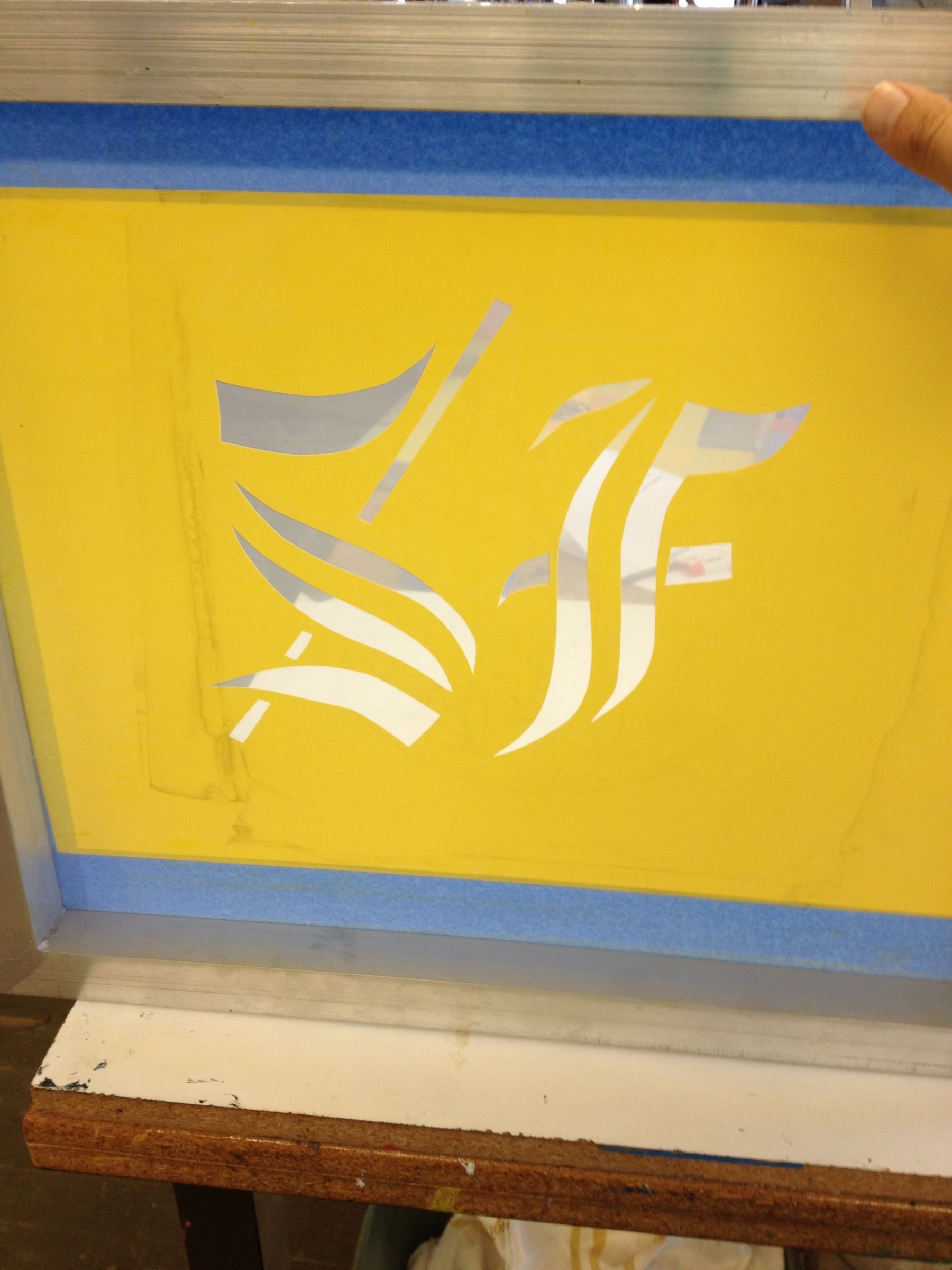Hand Cut Vinyl Stencil Production and Modification for Silkscreen