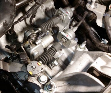 Reinstall the Shift Cable Bracket 