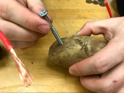 potato battery experiment youtube Insert the Zinc-plated Screw Into the Potato