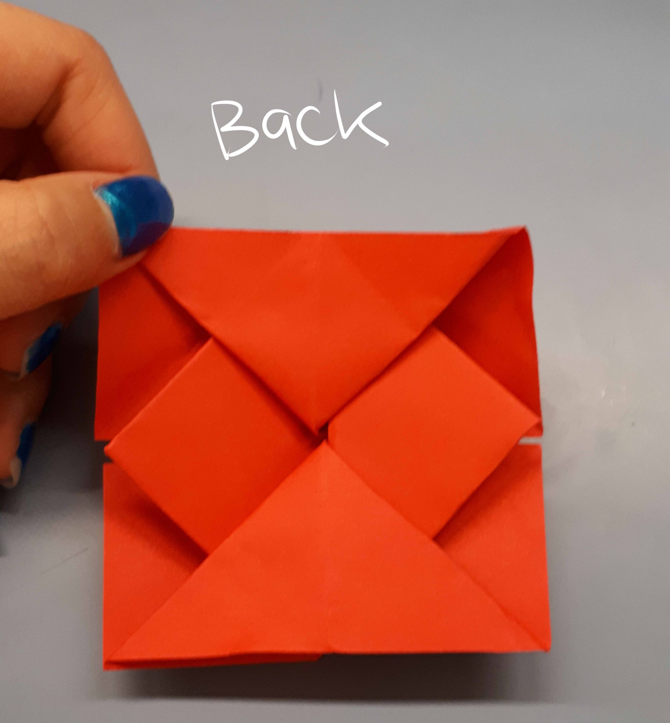 Step 8: Push the Triangles Down and Flip