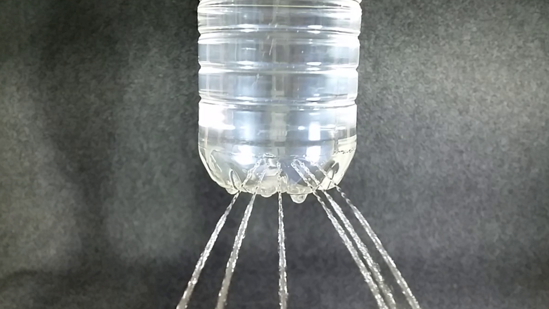 easy experiments with surface tension Water Tension With a Bottle
