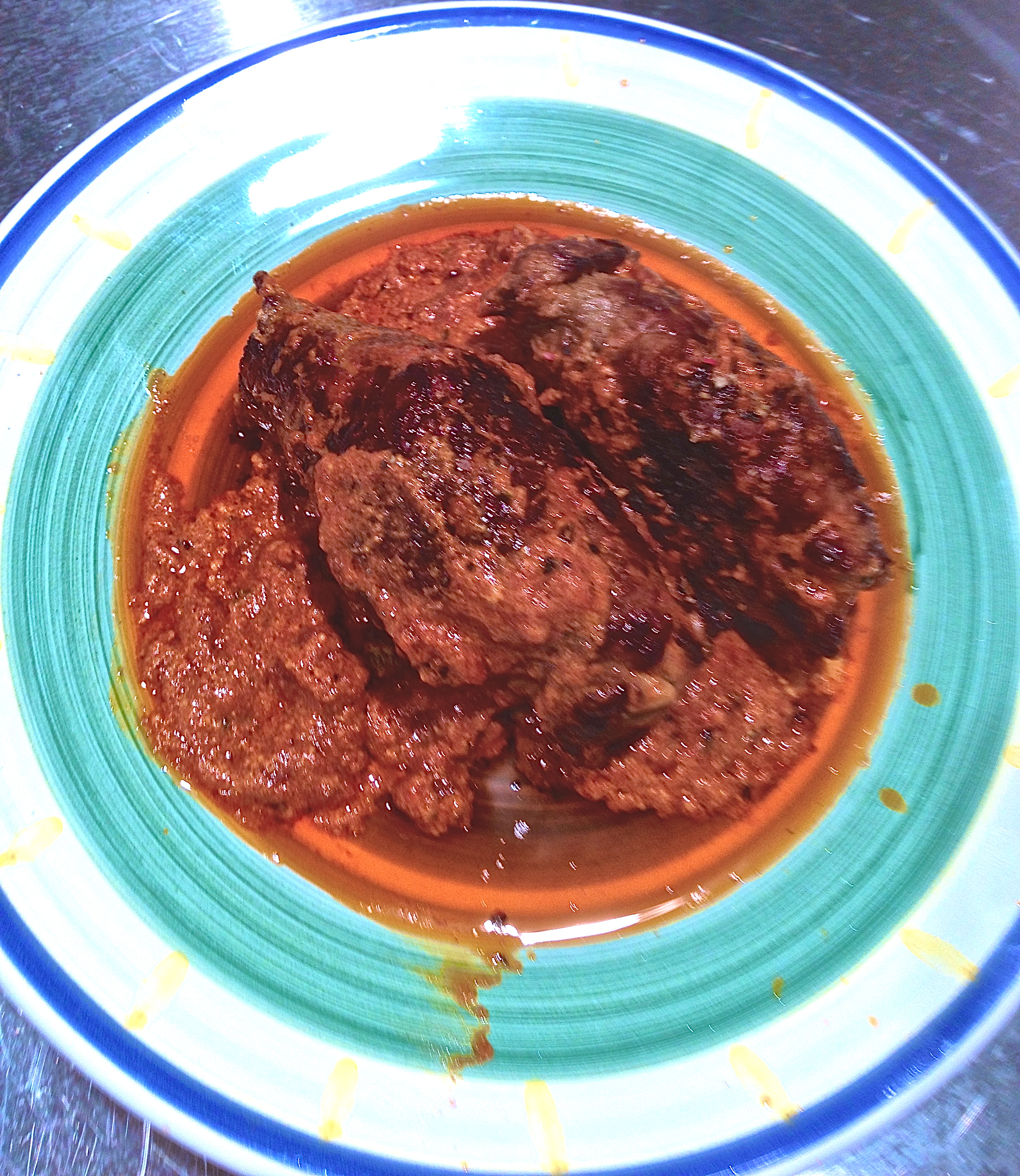 Braciole....stuffed Flank Steak in a Creme/tomato Sauce