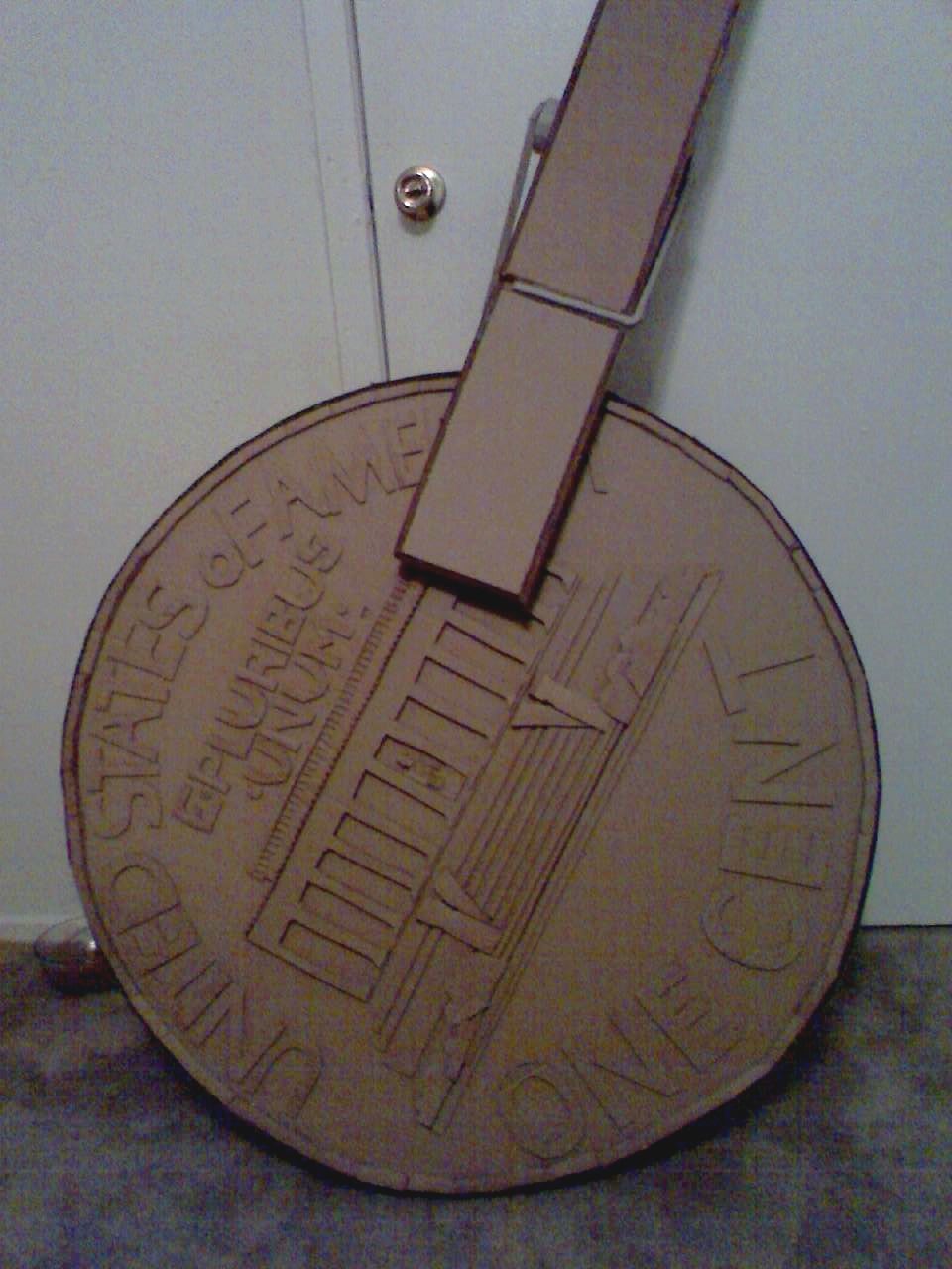 Penny Pincher Sculpture in Cardboard