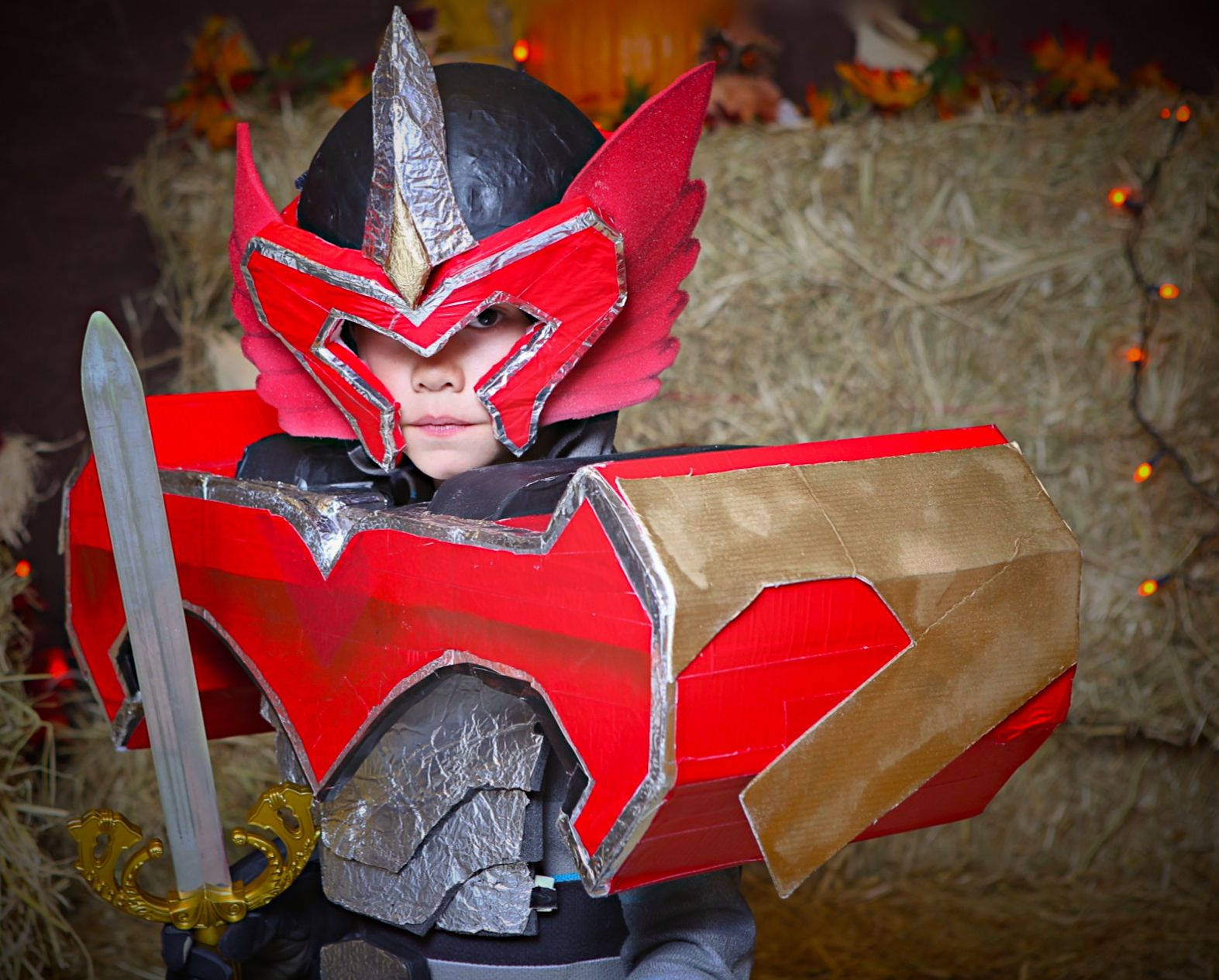 A Power Ranger Mystic Phoenix Titan Costume Made Mostly From Reclaimed Construction Foam Core, Aluminium Foil and Tape.