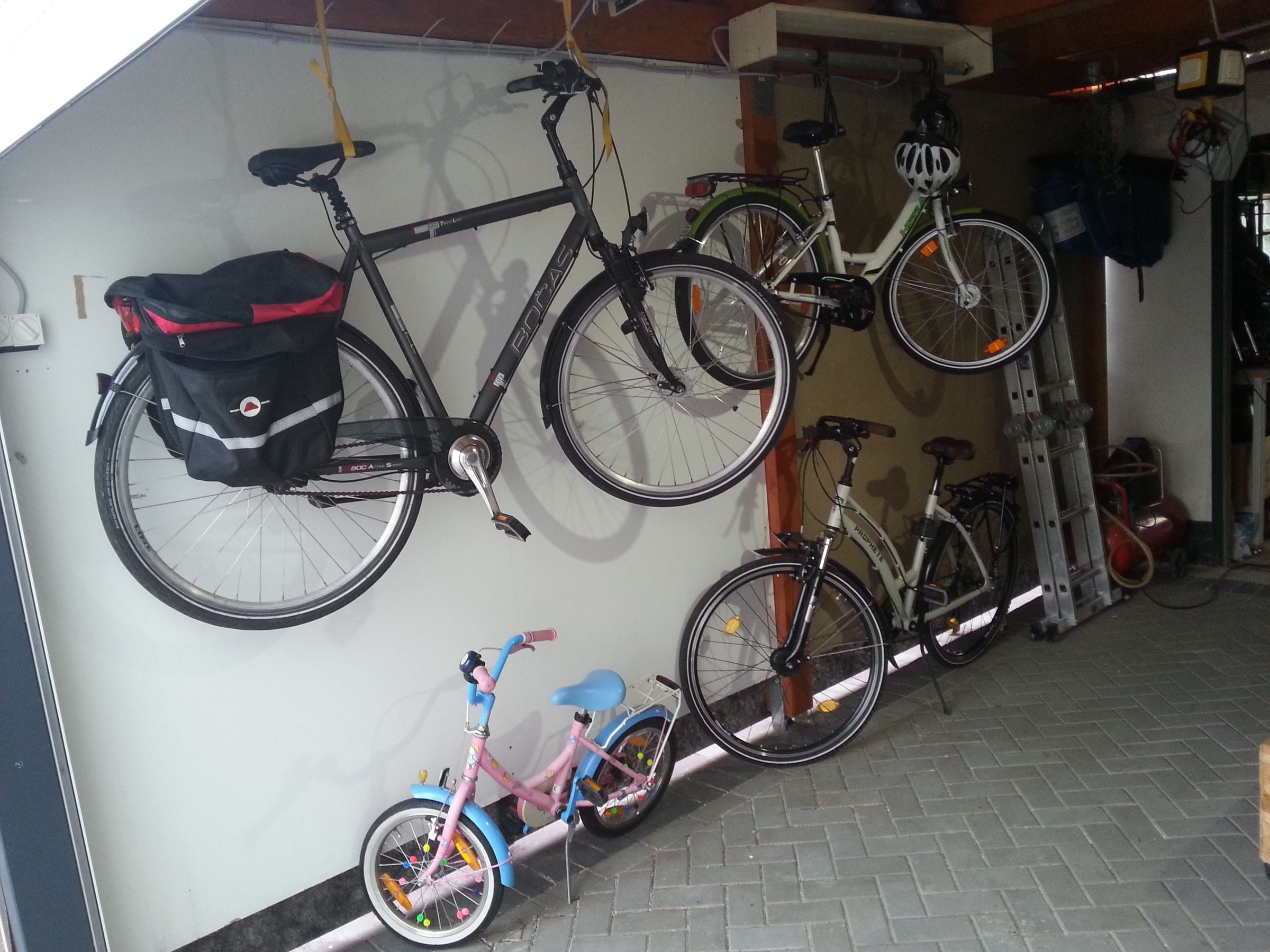 Bike Lift to Save Some Place.  Made of   Tubular Motors for Roller Shutters