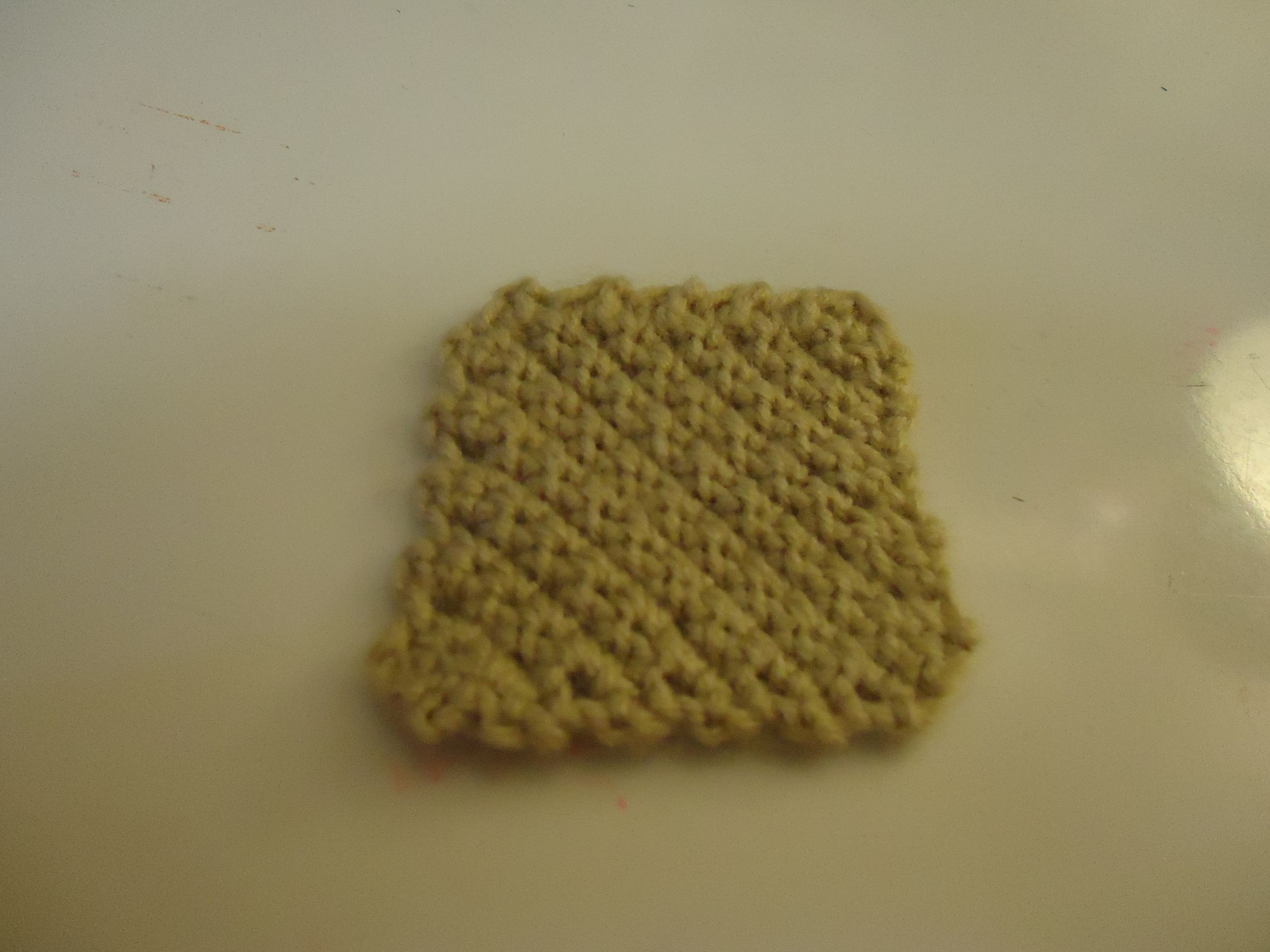 Third Beginner Crochet Project: Increase/Decrease Square